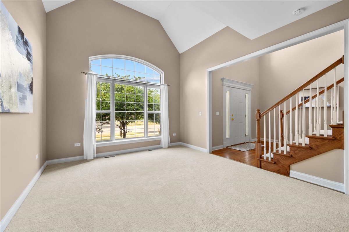 1112 Stonehaven Circle Aurora, IL 60504 - Photo 13 of 28 a view of an empty room with a window