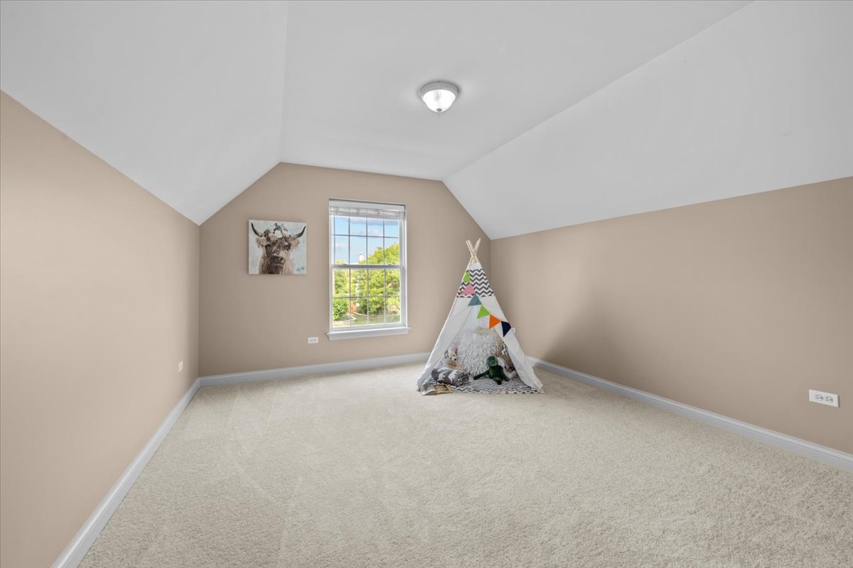 1112 Stonehaven Circle Aurora, IL 60504 - Photo 24 of 28 an empty room with windows
