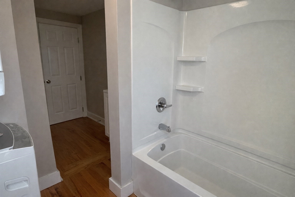 13 Hampden Street, Unit 2 Westfield, MA 01085 - Photo 7 of 7 a bathroom with a tub