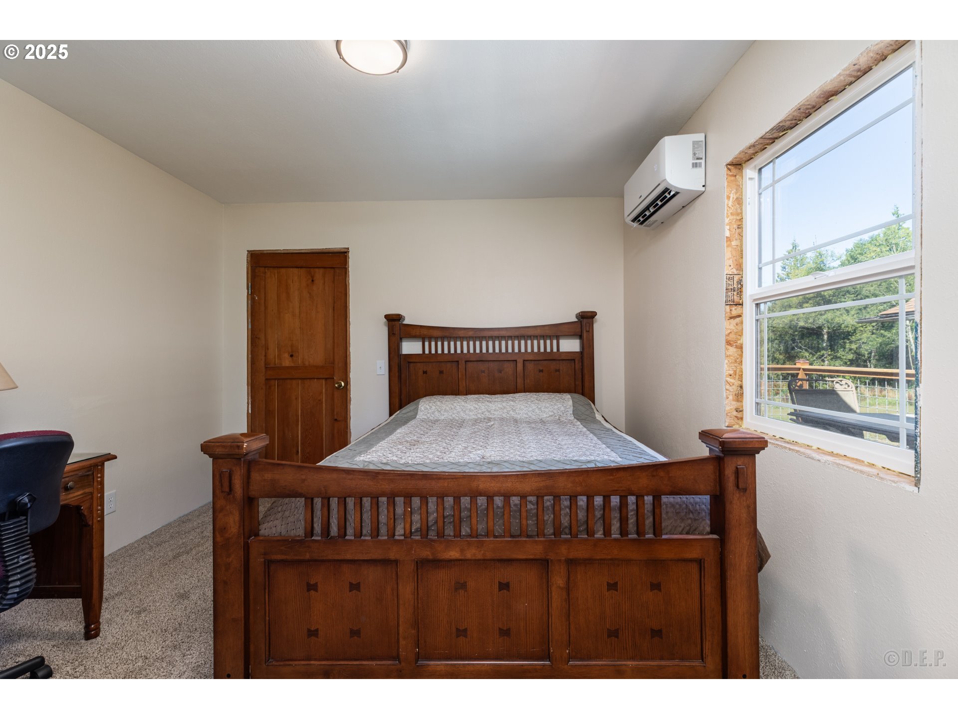 70392 Schumacher Road Rainier, OR 97048 - Photo 14 of 42 a bedroom with a bed and a window
