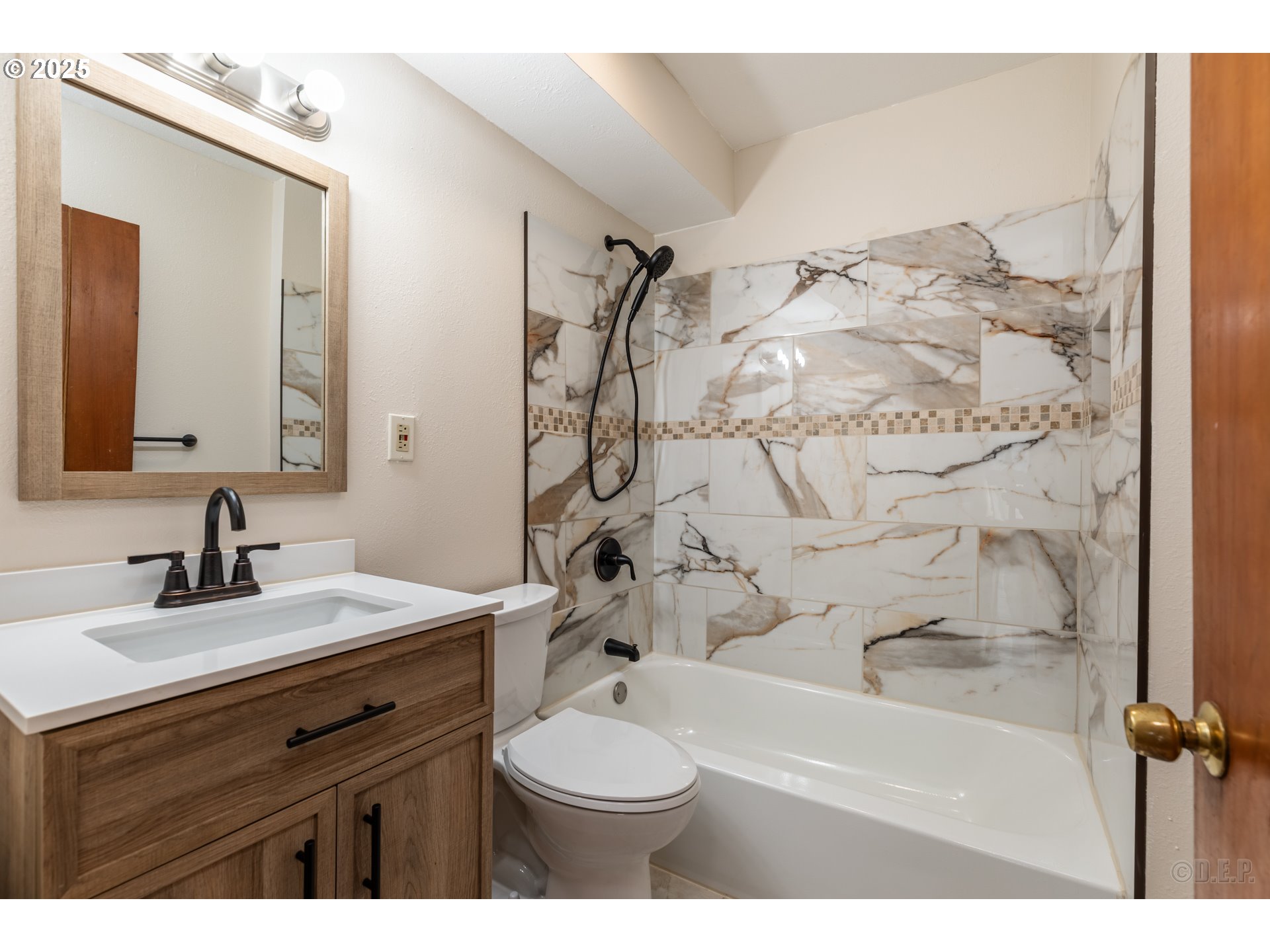 70392 Schumacher Road Rainier, OR 97048 - Photo 15 of 42 a bathroom with a sink vanity mirror and tub