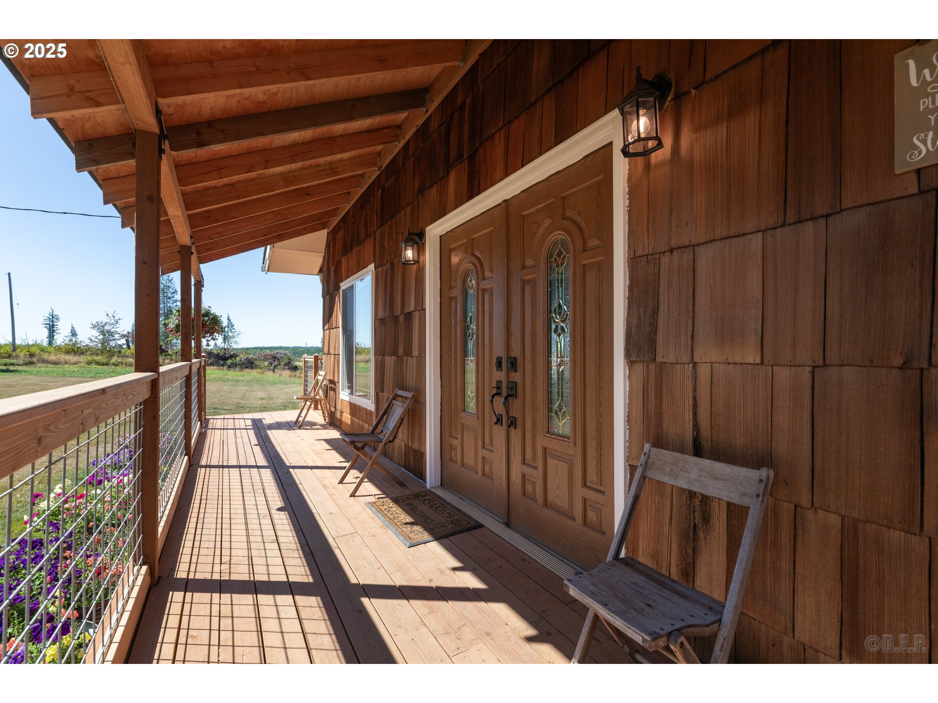 70392 Schumacher Road Rainier, OR 97048 - Photo 3 of 42 a view of balcony with wooden floor