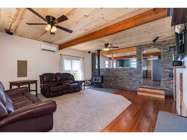 a view of living room filled with furniture