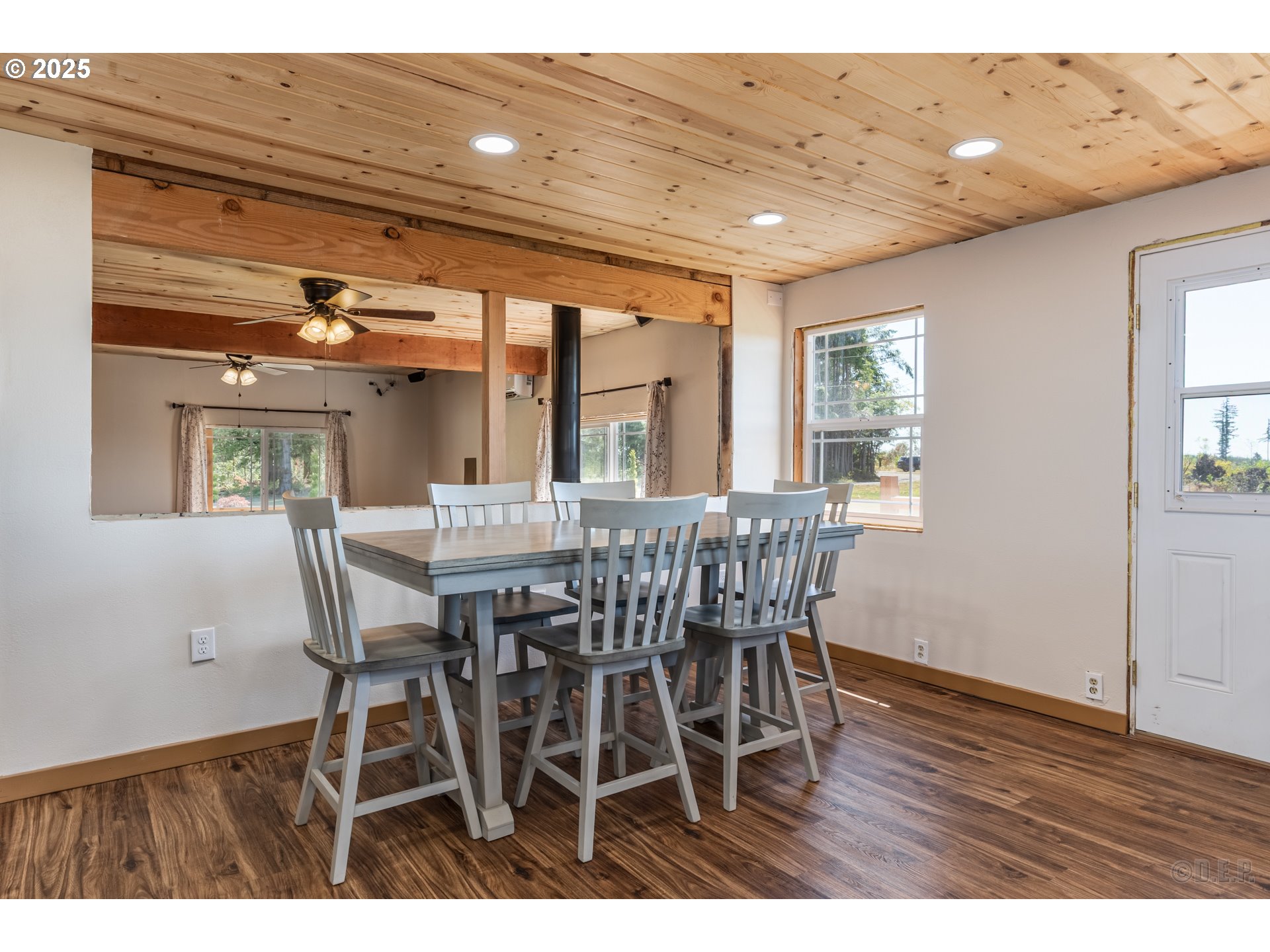 70392 Schumacher Road Rainier, OR 97048 - Photo 8 of 42 a view of a dining room with furniture and wooden floor