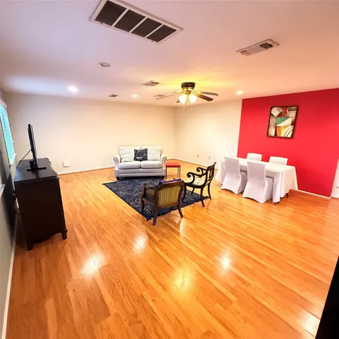 a living room with couch and a table