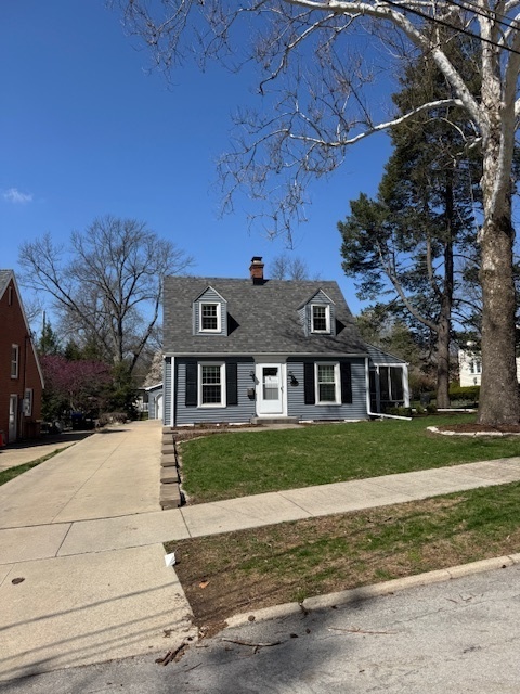 12 Norbloom Avenue Bloomington, IL 61701 - Photo 3 of 3 a front view of a house with a yard