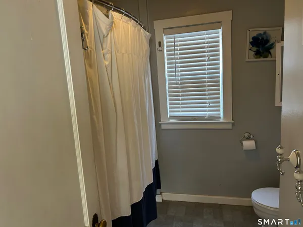 a bathroom with a sink and toilet