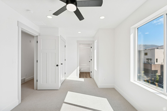 254 North Main Street Bountiful, UT 84010 - Photo 21 of 45 Unfurnished bedroom featuring light colored carpet, ensuite bath, recessed lighting, and a ceiling fan