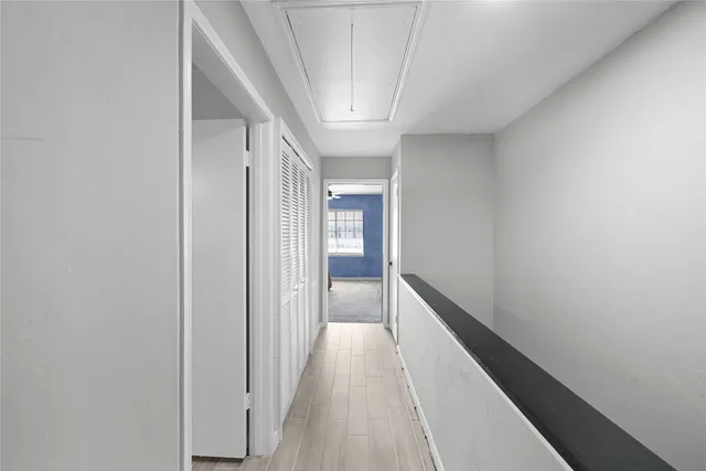 a view of hallway with stairs