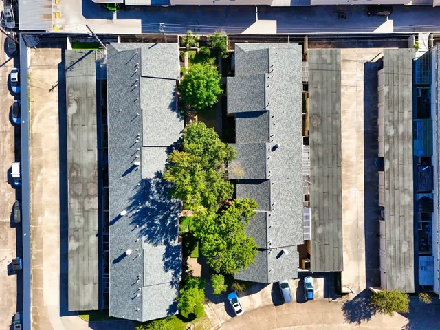 a view of a house with a potted plant