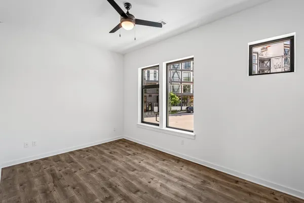 a view of empty room with windows