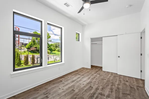 a view of an empty room with a window