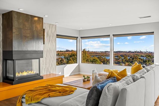 a view of a balcony with chairs