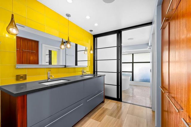 a view of a backyard with sitting area