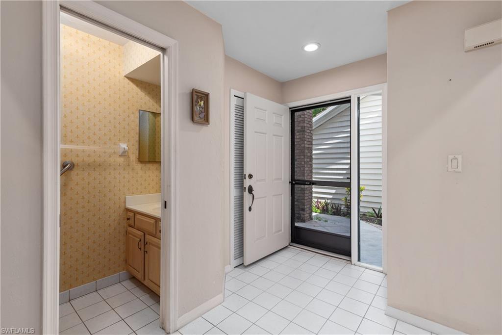 6658 Trident Way, Unit J4 Naples, FL 34108 - Photo 13 of 26 Half Bath (powder room)