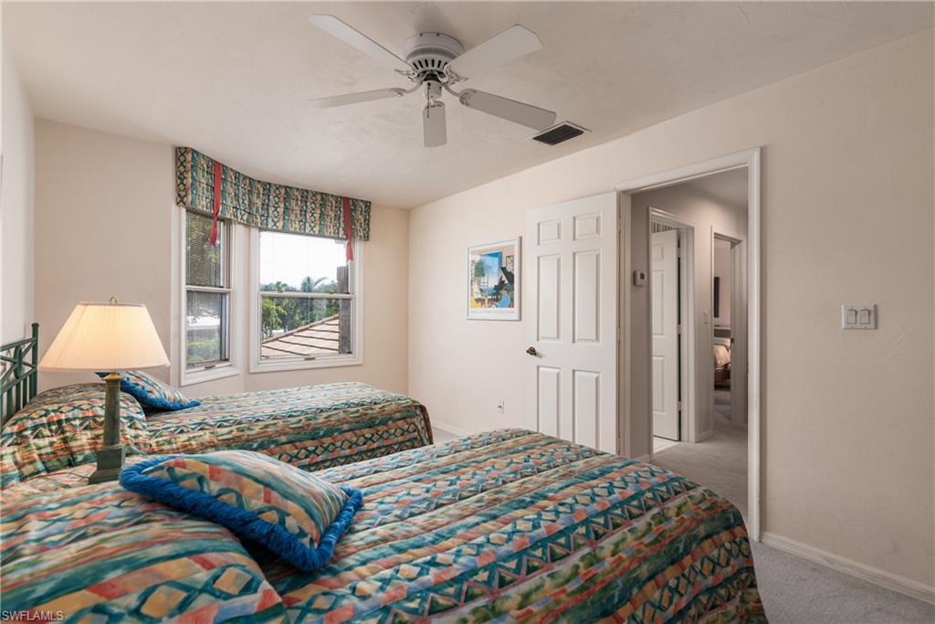 6658 Trident Way, Unit J4 Naples, FL 34108 - Photo 21 of 26 Upstairs Guest Bedroom #2