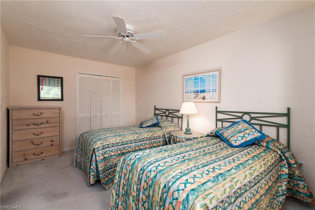 6658 Trident Way, Unit J4 Naples, FL 34108 - Photo 22 of 26 Upstairs Guest Bedroom #2