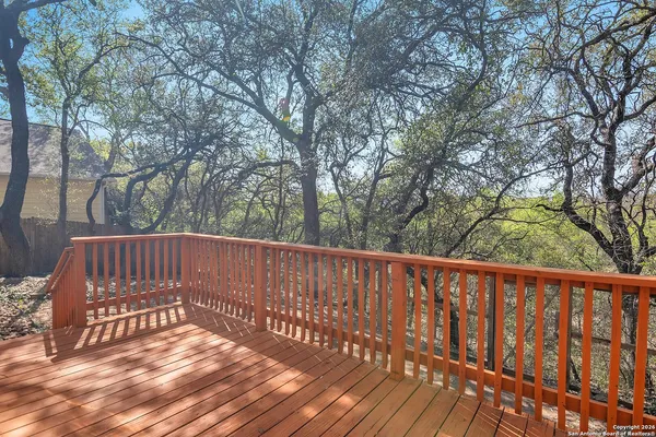 a backyard of a house with barbeque oven