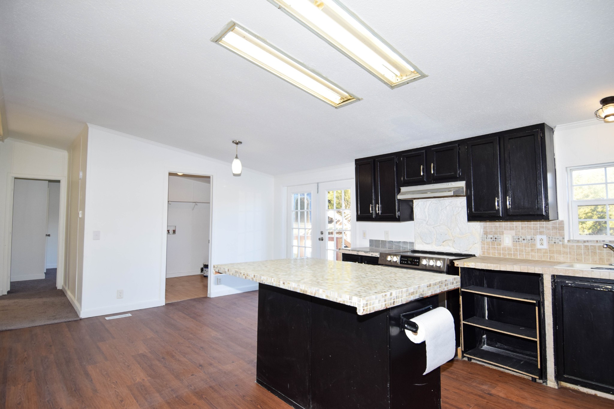 635 Celsor Road Hartsville, TN 37074 - Photo 17 of 44 a kitchen with a sink and a microwave