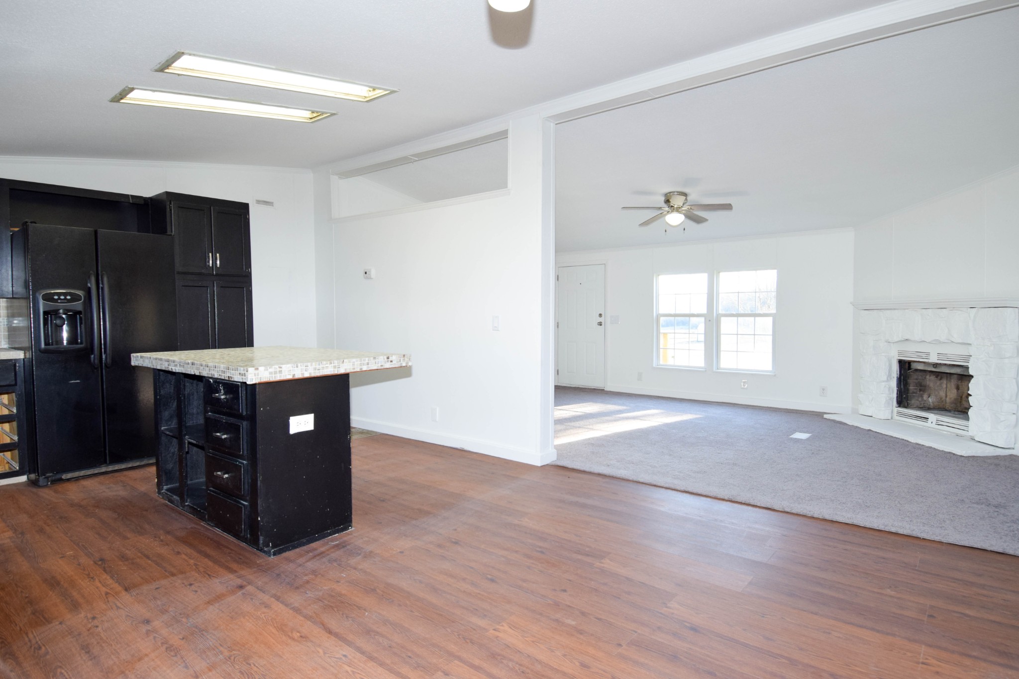 635 Celsor Road Hartsville, TN 37074 - Photo 19 of 44 a living room with a dresser and a fireplace