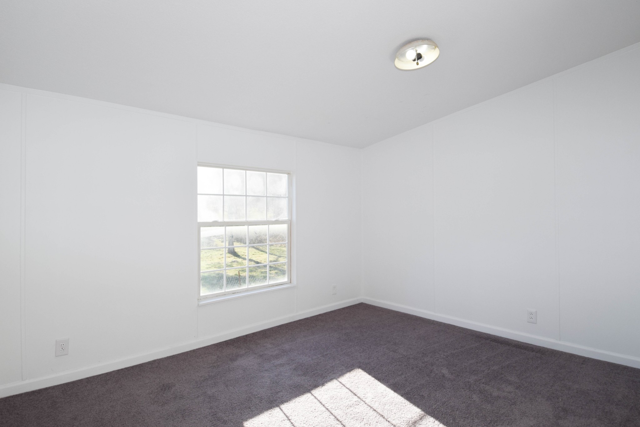 635 Celsor Road Hartsville, TN 37074 - Photo 33 of 44 an empty room with windows
