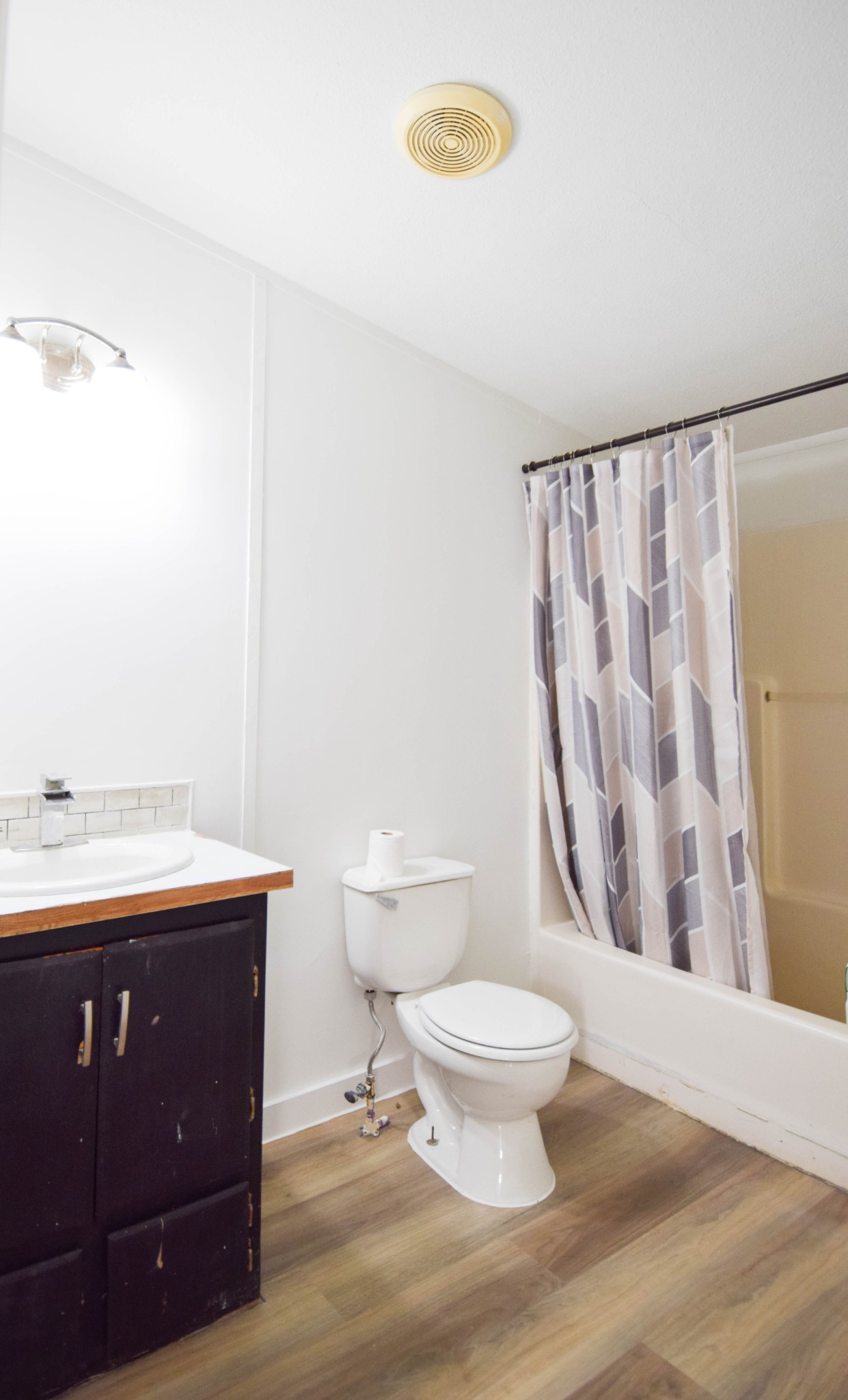 635 Celsor Road Hartsville, TN 37074 - Photo 36 of 44 a bathroom with a granite countertop sink toilet and a mirror