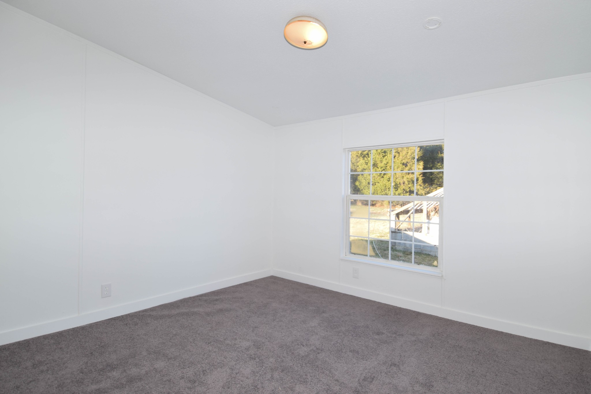 635 Celsor Road Hartsville, TN 37074 - Photo 37 of 44 an empty room with windows