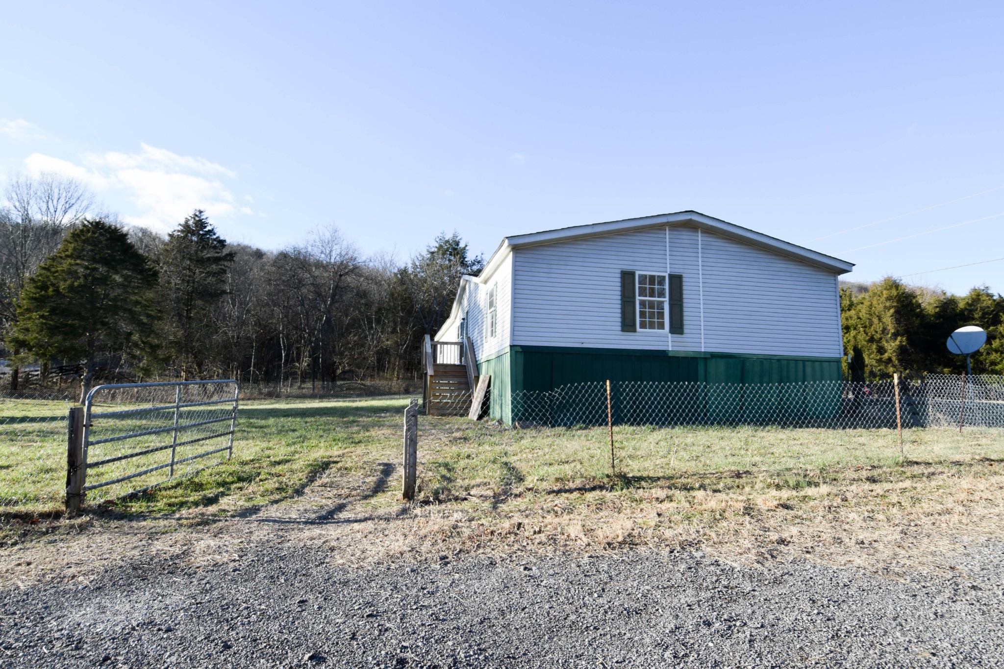 635 Celsor Road Hartsville, TN 37074 - Photo 4 of 44 a house view with a backyard space
