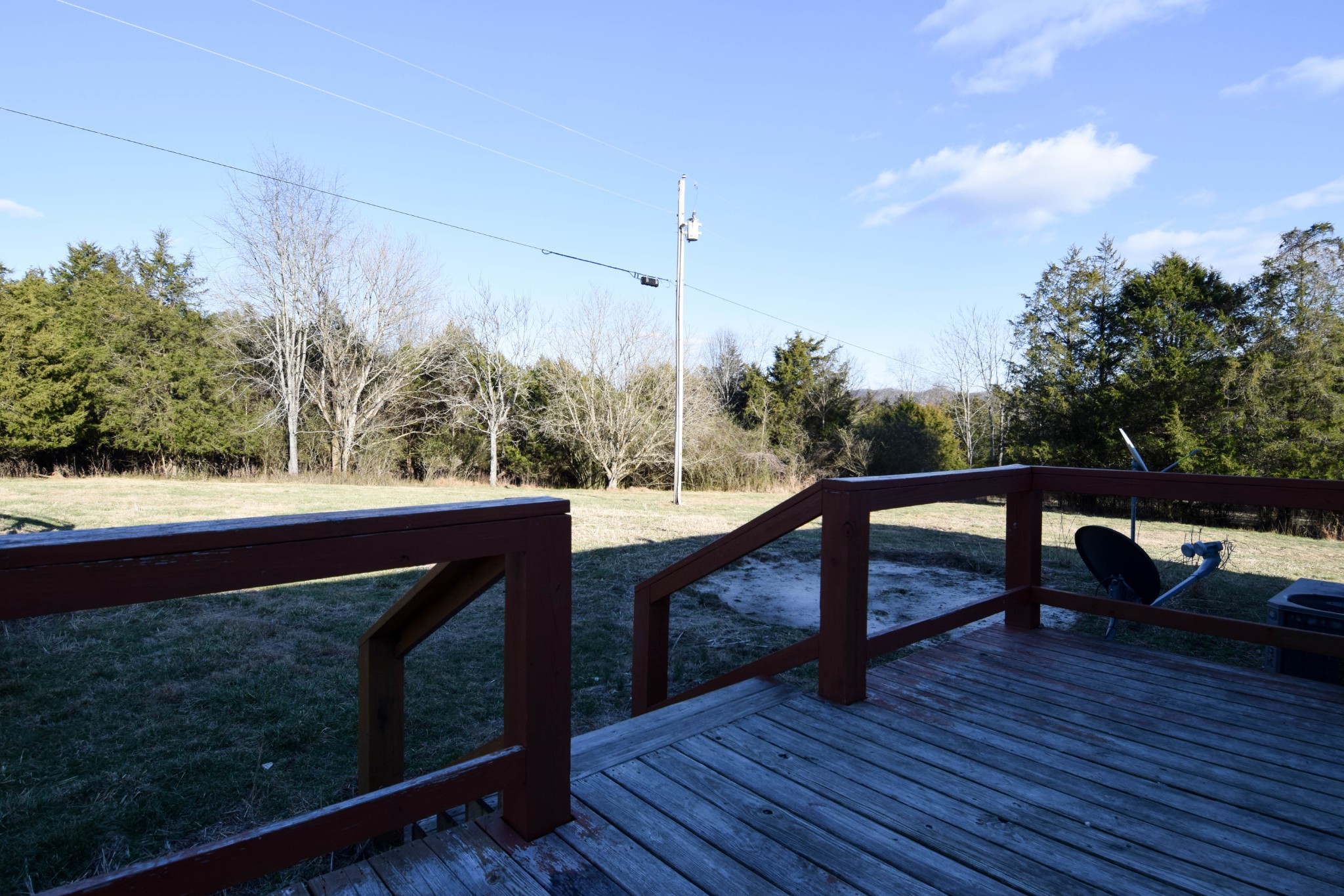635 Celsor Road Hartsville, TN 37074 - Photo 42 of 44 a view of a chairs and table on the wooden floor