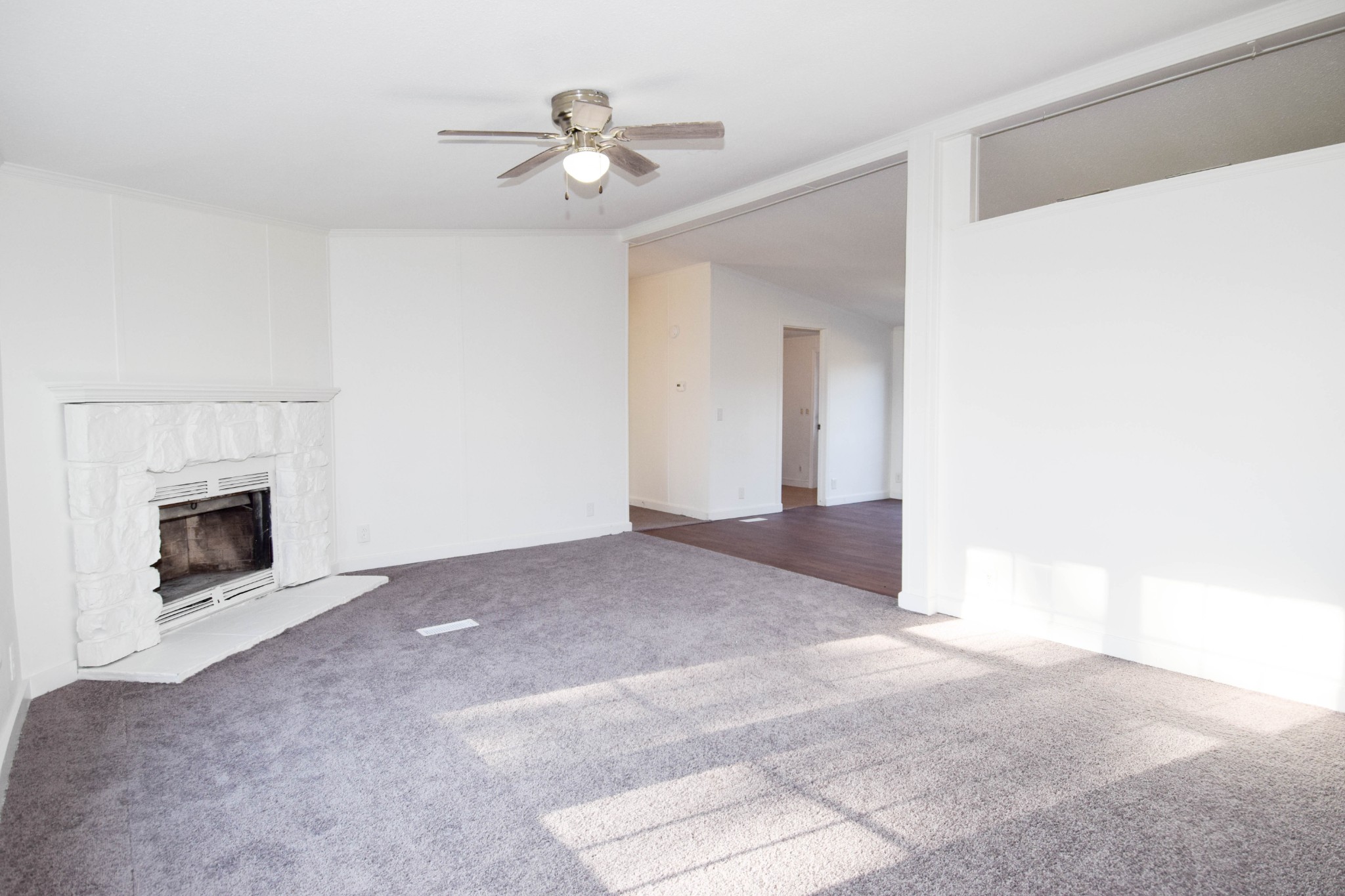 635 Celsor Road Hartsville, TN 37074 - Photo 10 of 44 a view of an empty room with a fireplace
