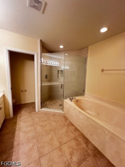 10032 Ravello Boulevard Fort Myers, FL 33905 - Photo 7 of 16 a bathroom with a bathtub and a shower