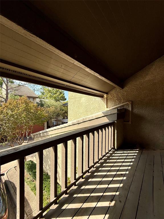 4513 North O'Connor Road, Unit 2133 Irving, TX 75062 - Photo 23 of 33 a view of balcony with wooden floor