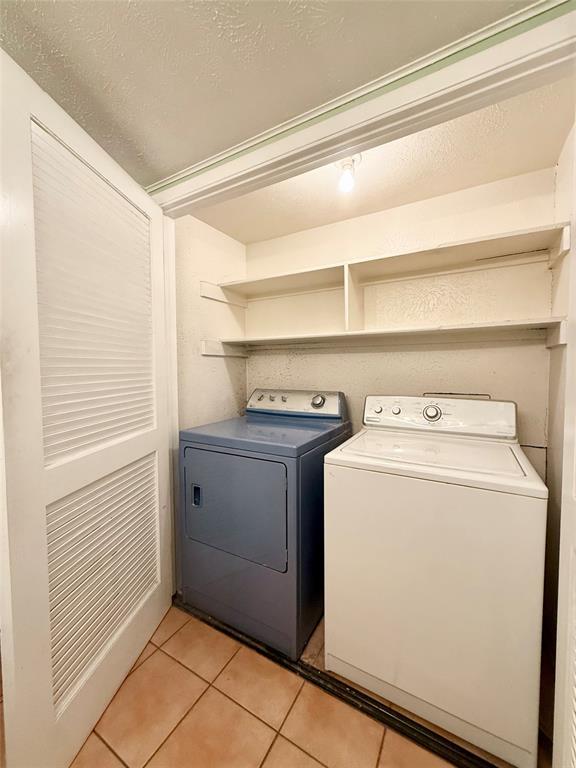 4513 North O'Connor Road, Unit 2133 Irving, TX 75062 - Photo 26 of 33 a utility room with dryer and washer