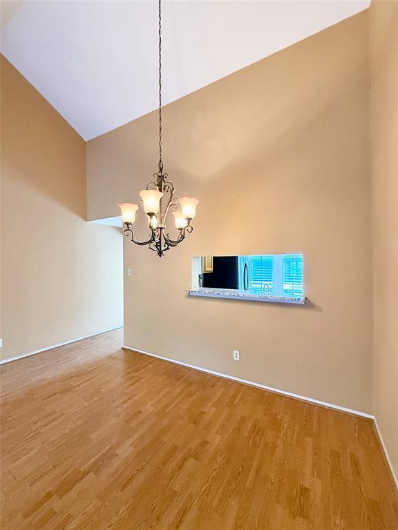 4513 North O'Connor Road, Unit 2133 Irving, TX 75062 - Photo 8 of 33 a view of a room with a hanging light and kitchen