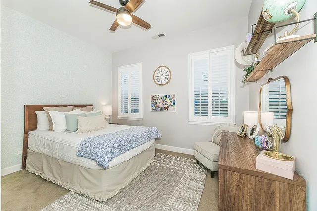 a bathroom with a shower a toilet and a shower