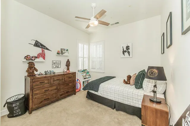 a living room with furniture window and flat screen tv