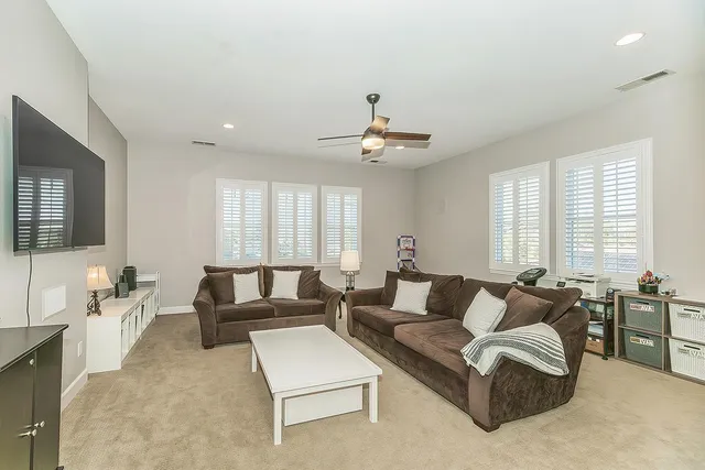 a view of a chairs and table in the patio