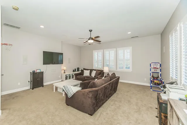 a view of a swimming pool with a yard