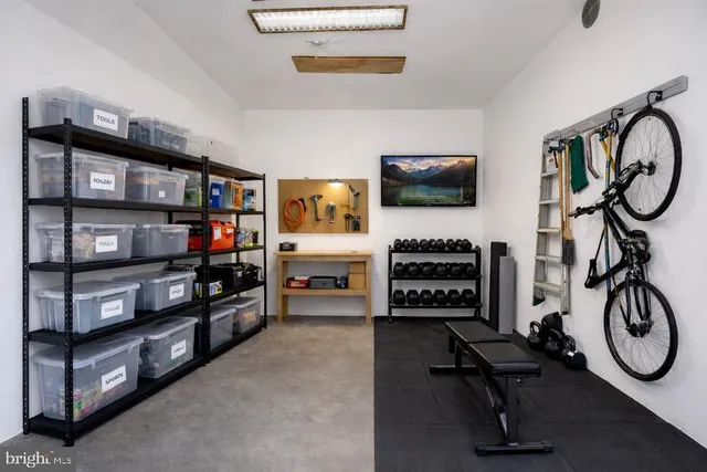 a room with furniture and a flat screen tv