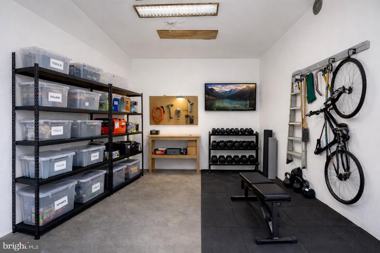 1633 Shadyside Drive Edgewater, MD 21037 - Photo 11 of 12 a room with furniture and a flat screen tv