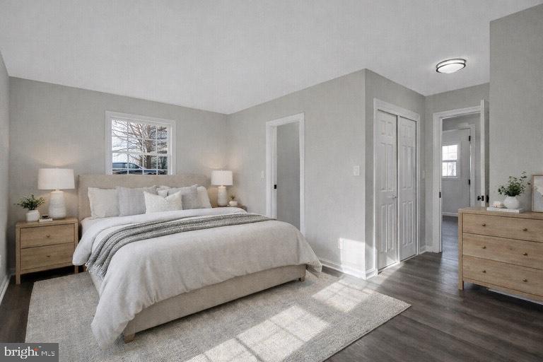 1633 Shadyside Drive Edgewater, MD 21037 - Photo 8 of 12 a bedroom with a bed and a dresser