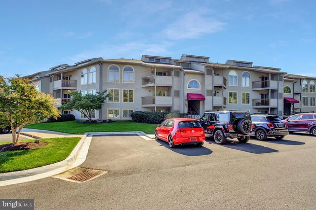 a car parked in front of a house