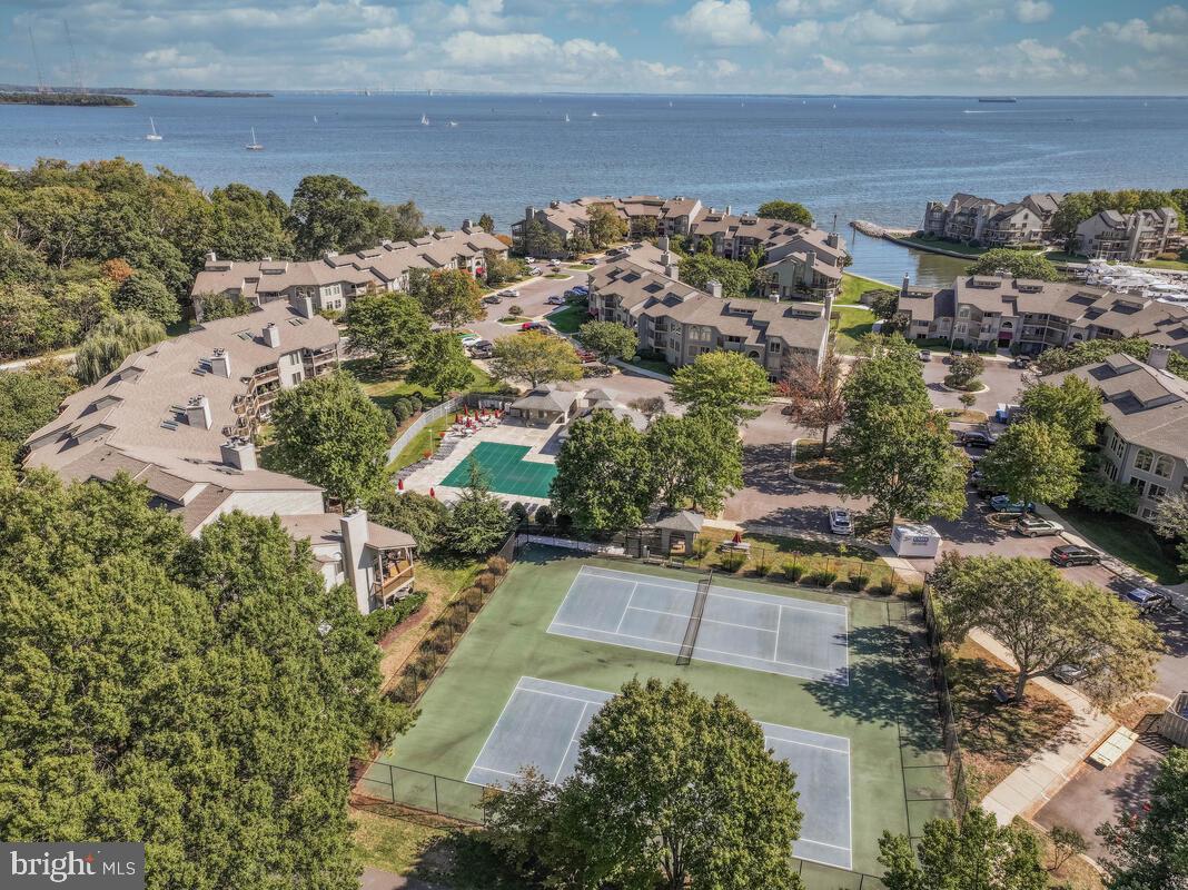 7002 Channel Village Court, Unit 101 Annapolis, MD 21403 - Photo 25 of 57 an aerial view of residential houses with outdoor space