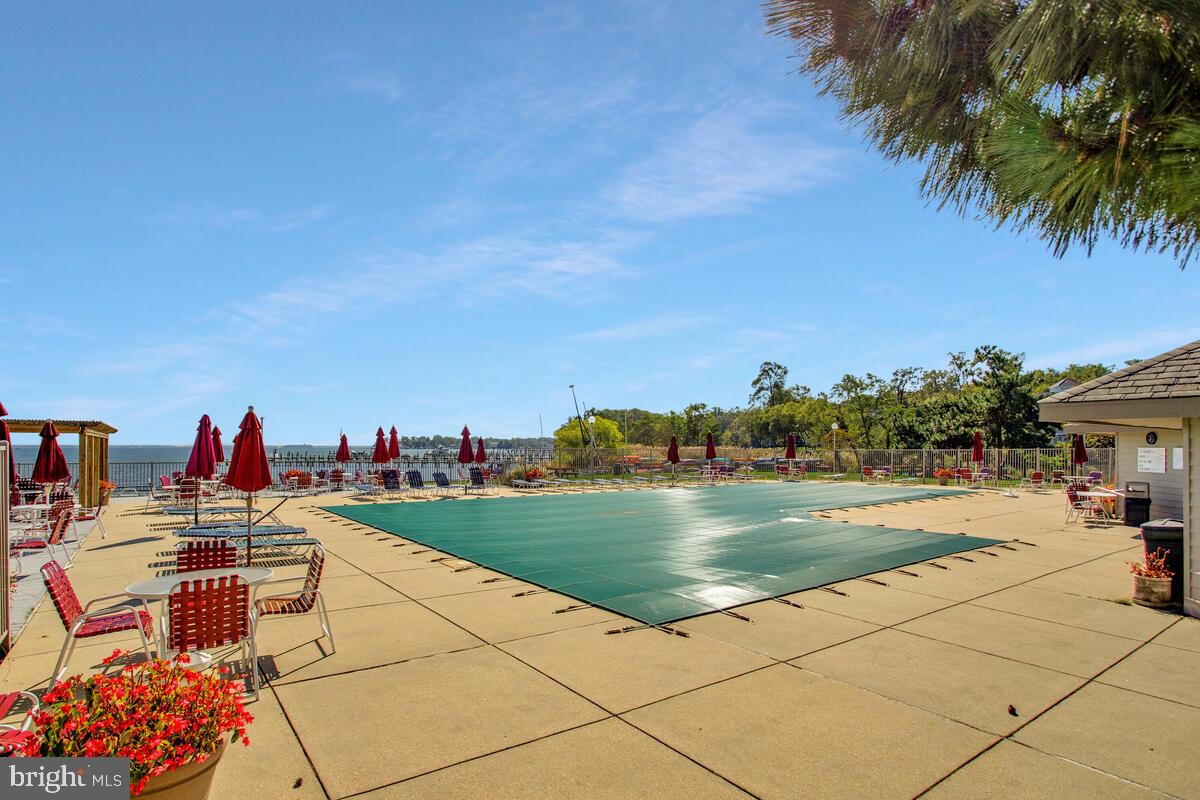 7002 Channel Village Court, Unit 101 Annapolis, MD 21403 - Photo 27 of 57 a view of outdoor space with seating area