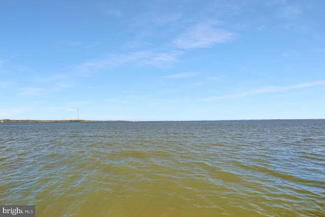 an aerial view of a house with a swimming pool