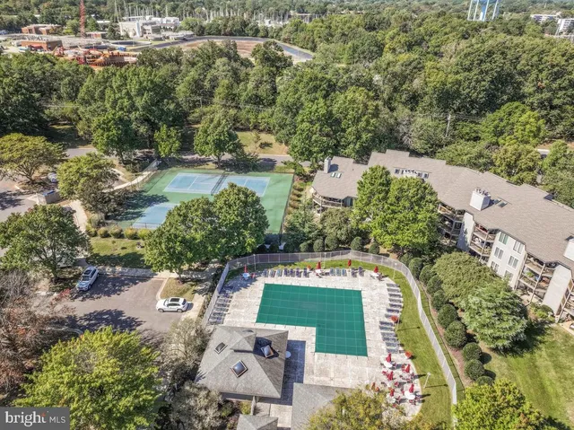 an aerial view of a house with a lake view