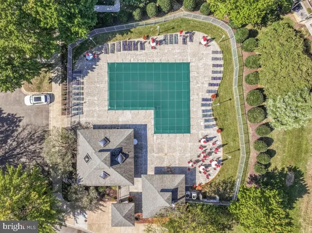 an aerial view of a house with a garden