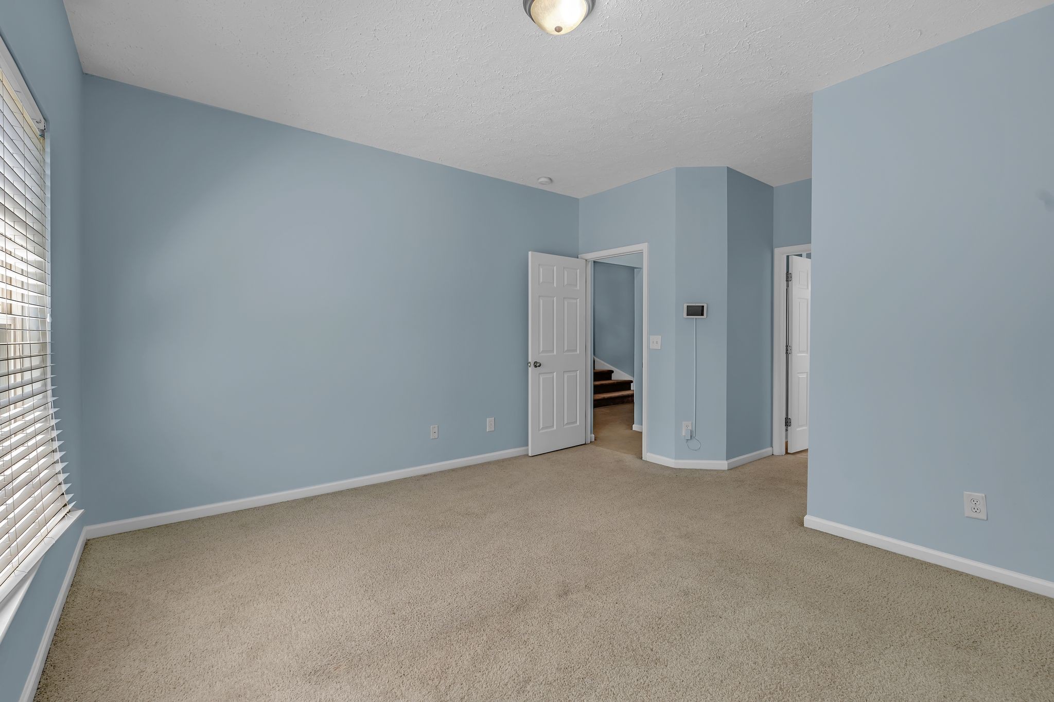 1264 West Running Brook Road Nashville, TN 37209 - Photo 15 of 28 an empty room with windows