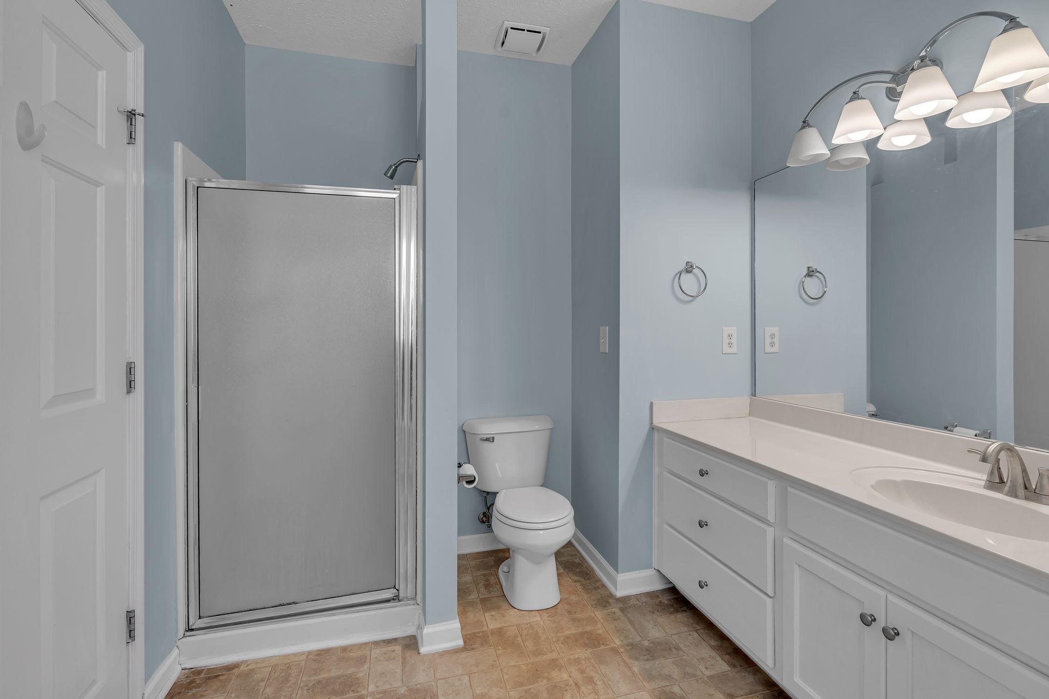 1264 West Running Brook Road Nashville, TN 37209 - Photo 17 of 28 a spacious bathroom with a granite countertop sink a toilet and a mirror