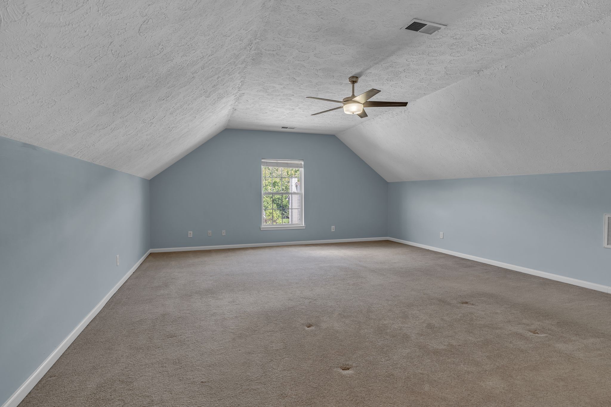 1264 West Running Brook Road Nashville, TN 37209 - Photo 19 of 28 an empty room with windows and fan